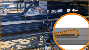 Montaż prowadnika kablowego z boku dźwigara suwnicy